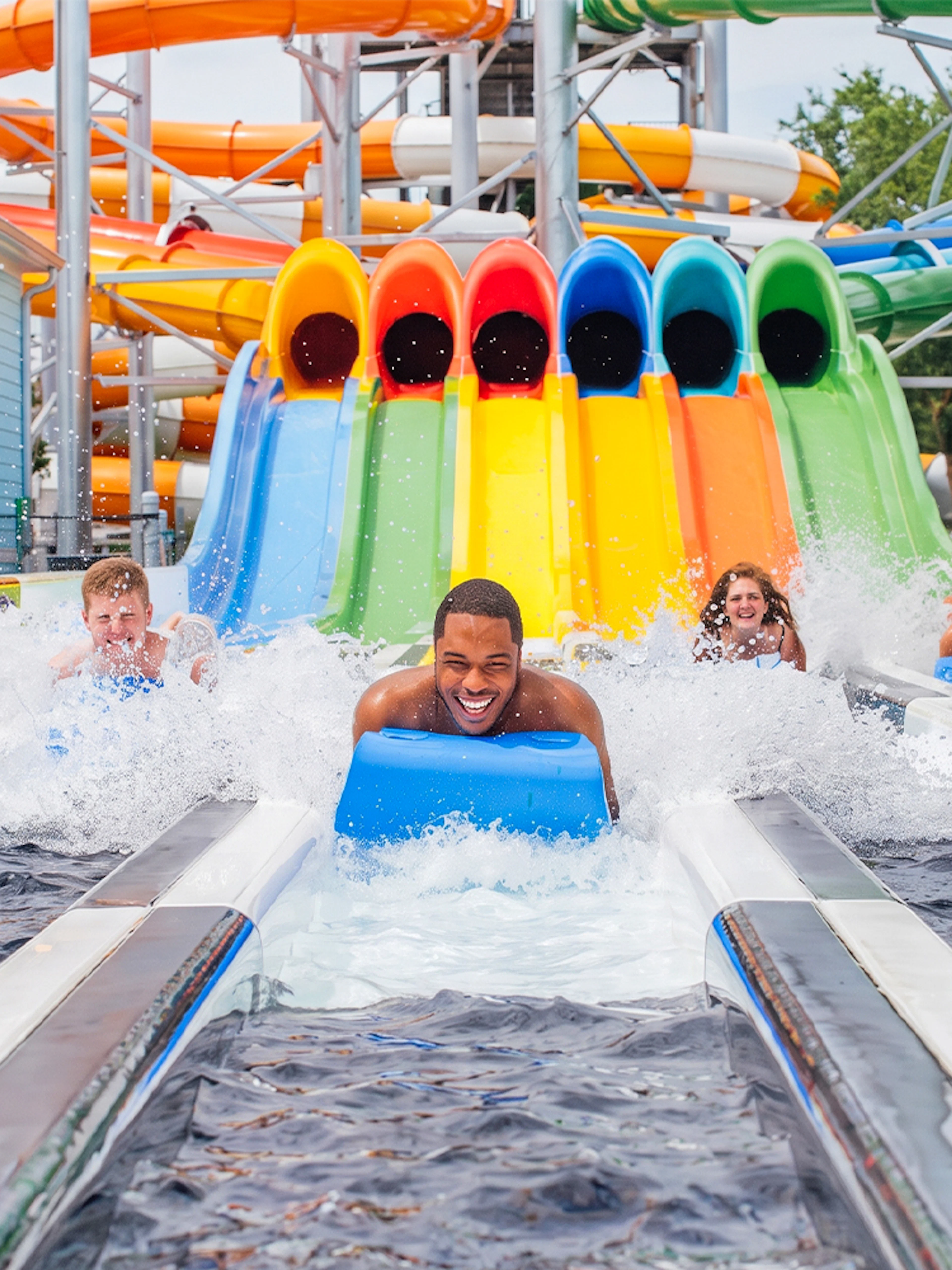 Visitors enjoying water slides at Hurricane Harbor New Jersey.