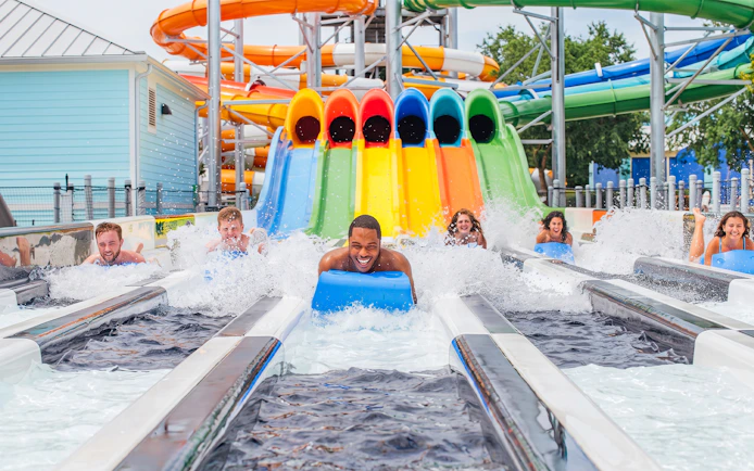 Visitors enjoying water slides at Hurricane Harbor New Jersey.
