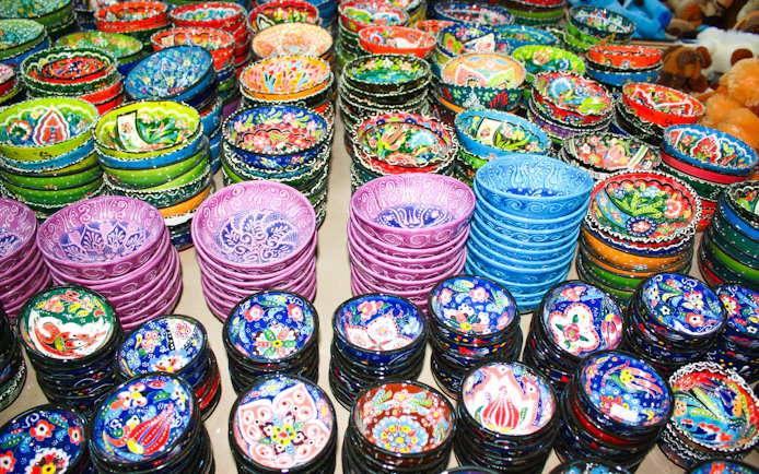 Colorful ceramic bowls at a souk in Jordan.