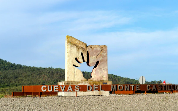 From Santander: El Castillo and Las Monedas Caves Guided Tour with Private Transport