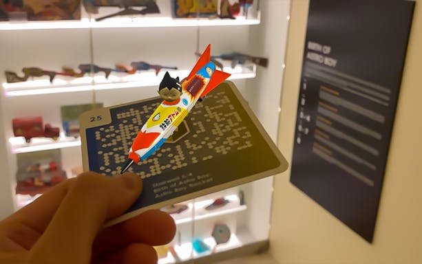 Astro Boy toy rocket displayed at MINT Museum of Toys, Singapore.