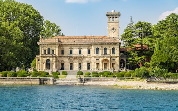 Historic villa on Lake Como shoreline during public tour.