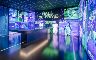 Hall of Fame exhibit at Rafa Nadal Museum featuring tennis legends.