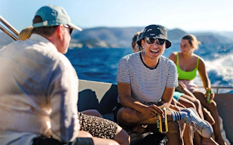 Group enjoying a boat ride on the Adriatic Sea near Dubrovnik, Croatia.