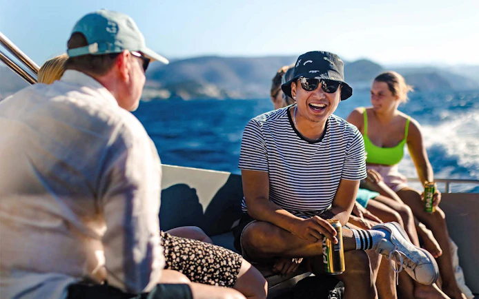 Group enjoying a boat ride on the Adriatic Sea near Dubrovnik, Croatia.