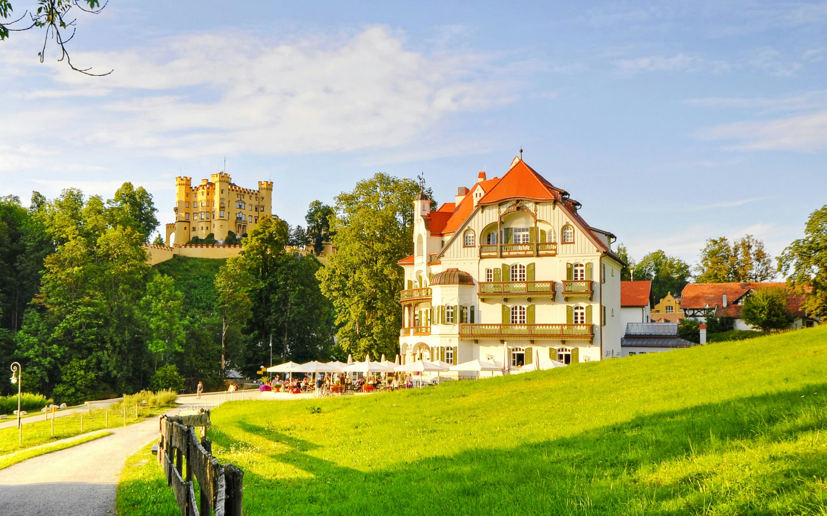 Museum of the Bavarian Kings near Alpsee with Hohenschwangau Castle in the background.