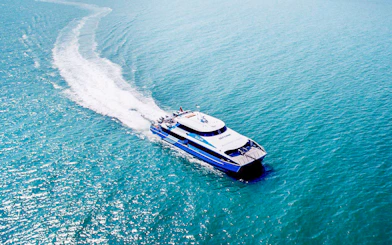 Ferry departing Rottnest Island towards Perth or Fremantle across the ocean.