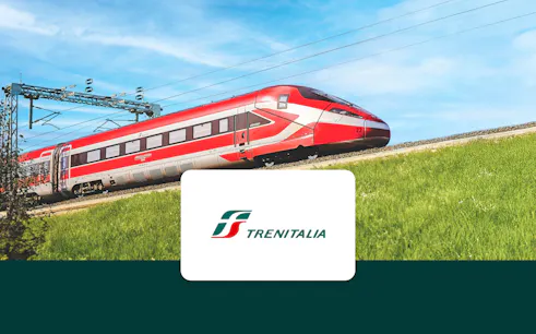 Trenitalia Frecciarossa train traveling through the countryside.