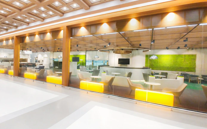 Skyhub Lounge seating and glass panes at Gimpo International Airport, Terminal 1.