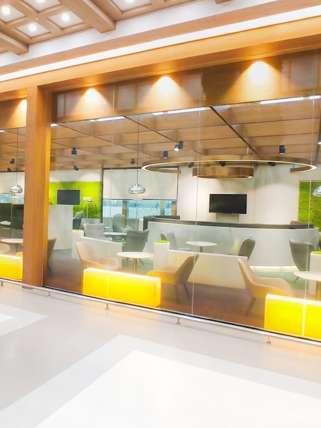 Skyhub Lounge seating and glass panes at Gimpo International Airport, Terminal 1.