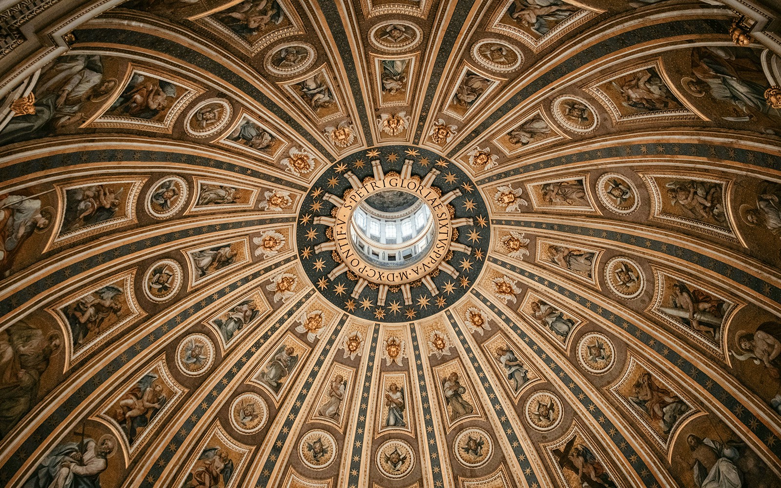 St. Peter's Basilica interior with detailed paintings and St. Peter's Cupola in Vatican City.
