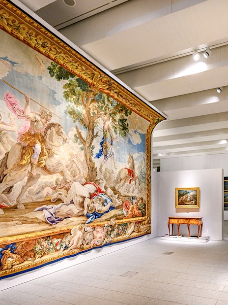 Royal Collections Gallery tapestry and ornate cabinet display.