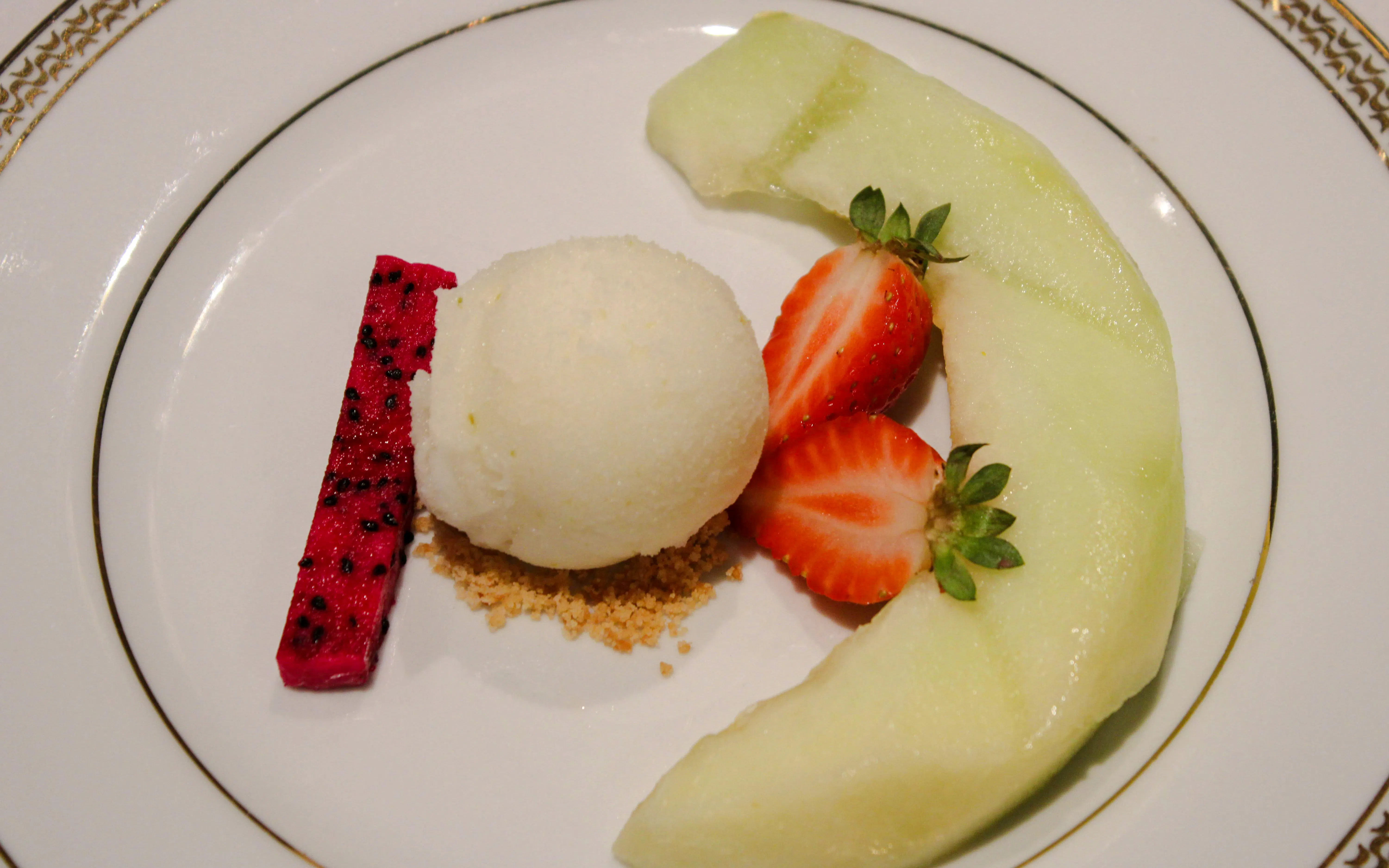 Dessert plate with sorbet, strawberries, melon, and dragon fruit at Roxy Dinner Show, Rio de Janeiro.
