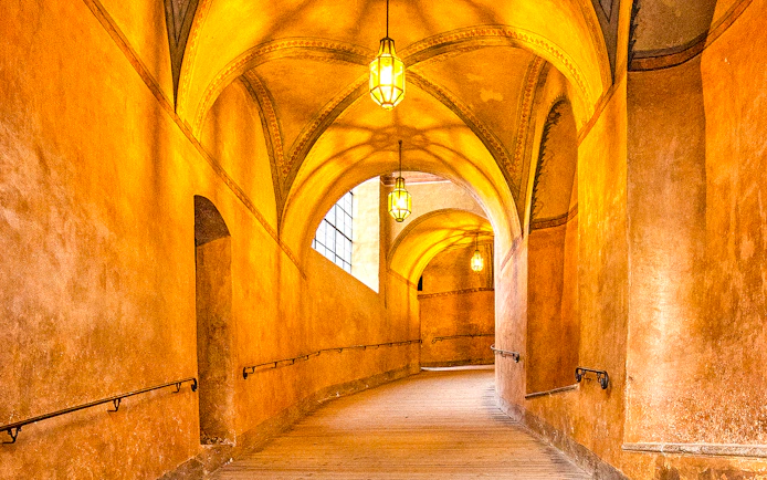 Ancient passageway with arched ceilings in Cesky Krumlov Castle, Czech Republic.