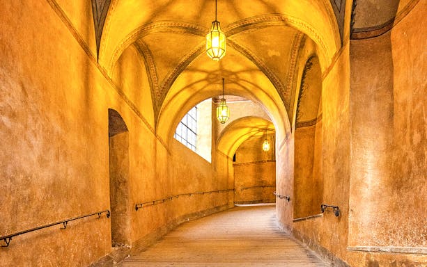 Ancient passageway with arched ceilings in Cesky Krumlov Castle, Czech Republic.