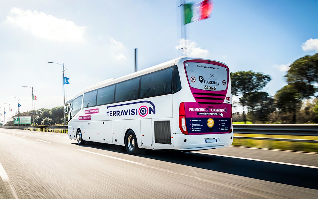Terravision bus on highway, Fiumicino Airport to Rome Termini transfer.