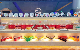 Refreshment display at Shanghai Hongqiao International Airport Terminal 2 with drinks and snacks.