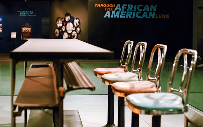 Lunch counter exhibit at Smithsonian National Museum of American History, highlighting African American history.