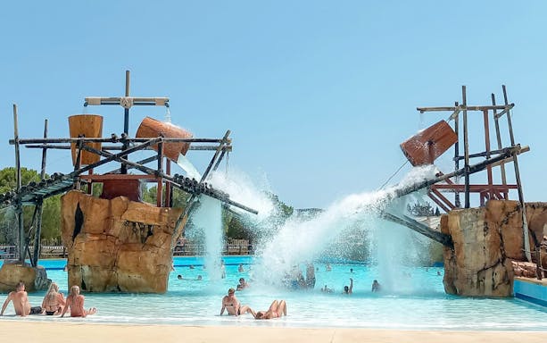 Tam Tam Splash pool area with water jets at Western Water Park.