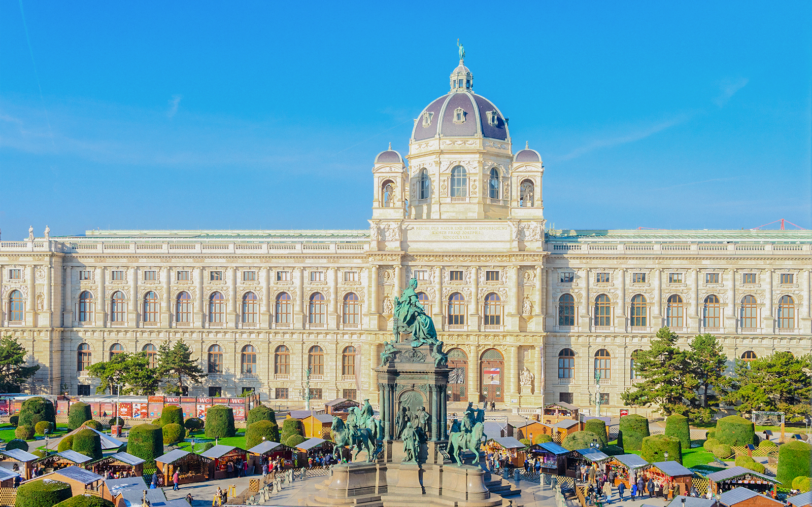 Museum of Natural History with Christmas market stalls in Vienna.
