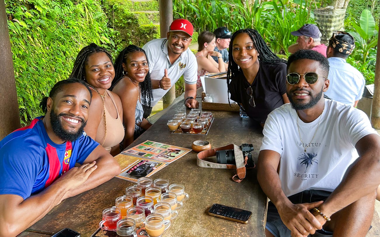 Group enjoying coffee tasting on a private tour in Ubud, Bali.