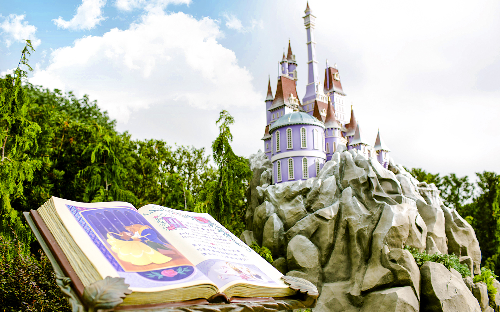 Open storybook and castle at Mystic Point, Disneyland Hong Kong.