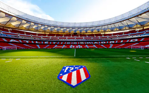 Cívitas Metropolitano Stadium field with Atlético de Madrid logo, Madrid, Spain.