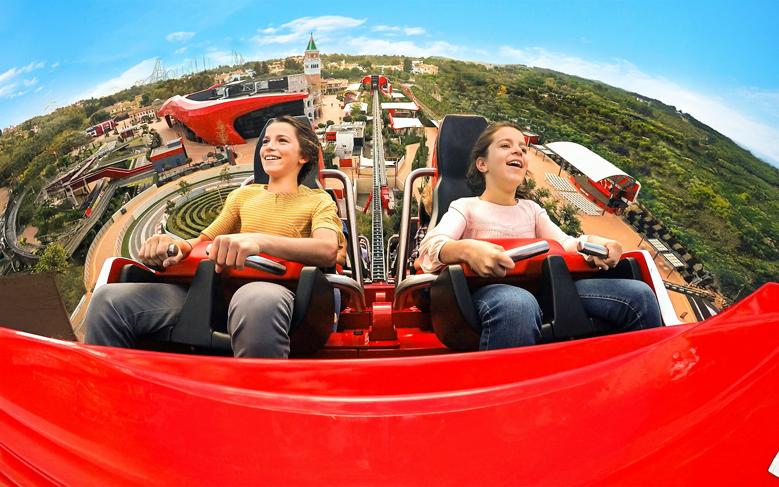A high ride being enjoyed by two young girls