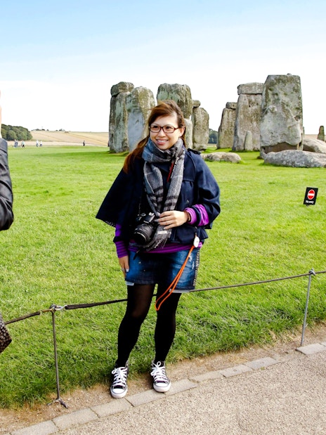 Visitors taking photos at Stonehenge, England.