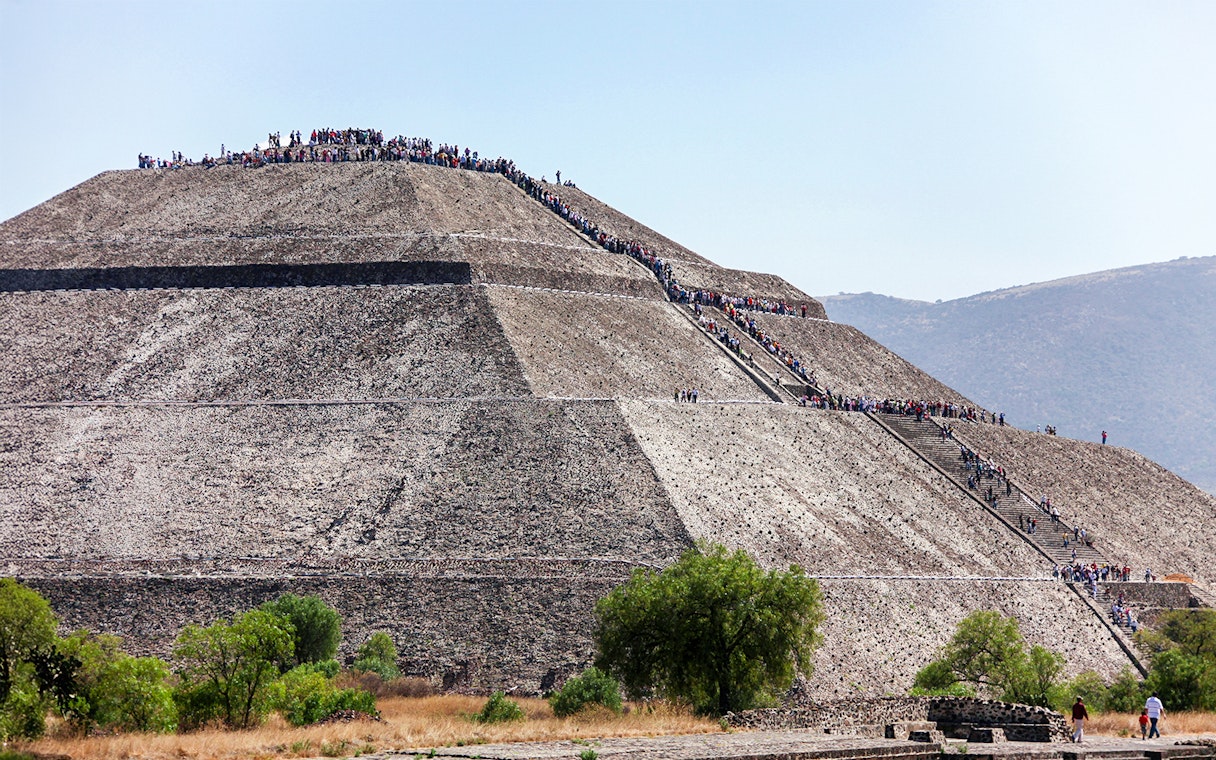 People climbing the Pyramid of the Sun in Teotihuacan, Mexico.
