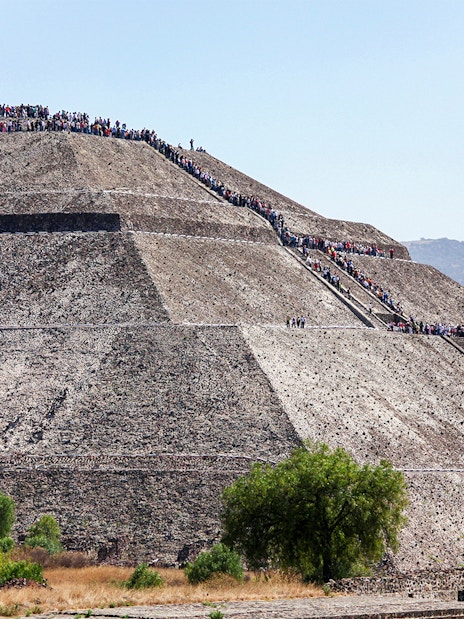 People climbing the Pyramid of the Sun in Teotihuacan, Mexico.
