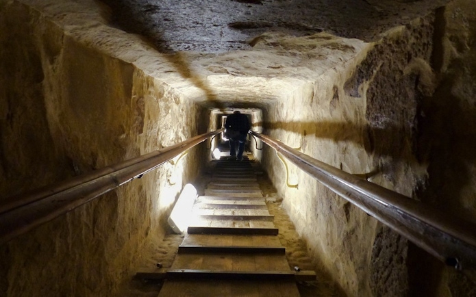 Descending passage inside the Great Pyramid near the Grand Egyptian Museum.