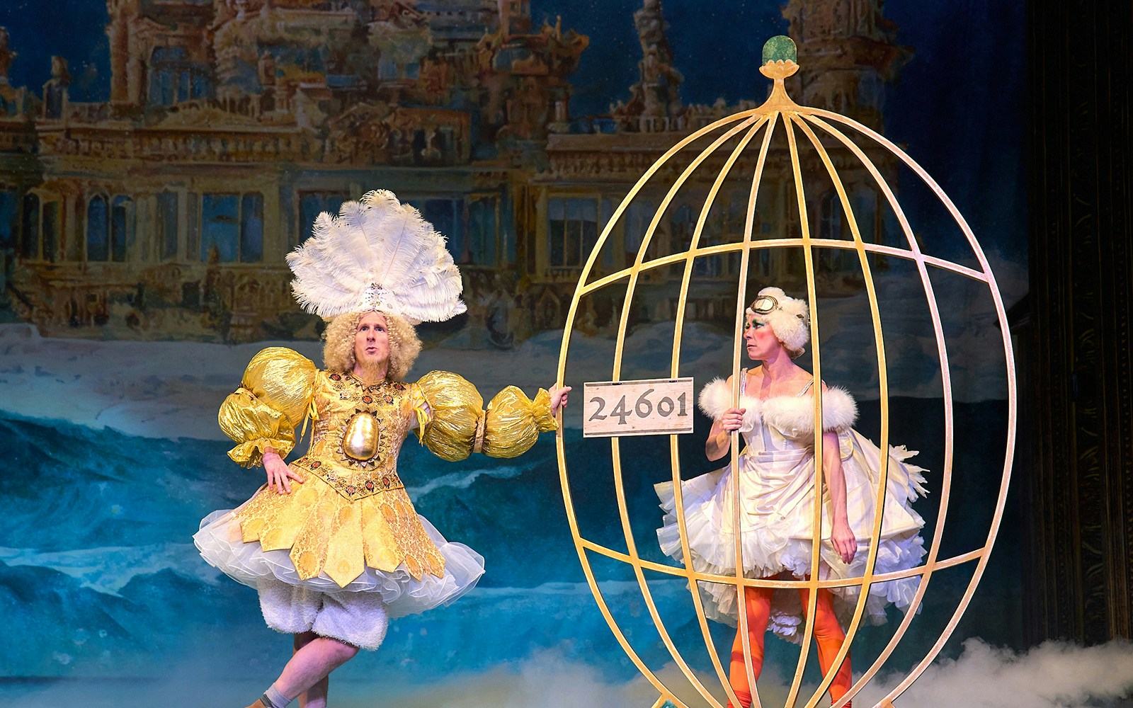 Mother Goose pantomime performance at London theatre with vibrant stage set.