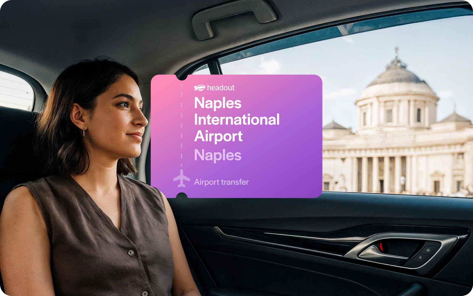 Private car transfer from Naples International Airport with view of city landmark.