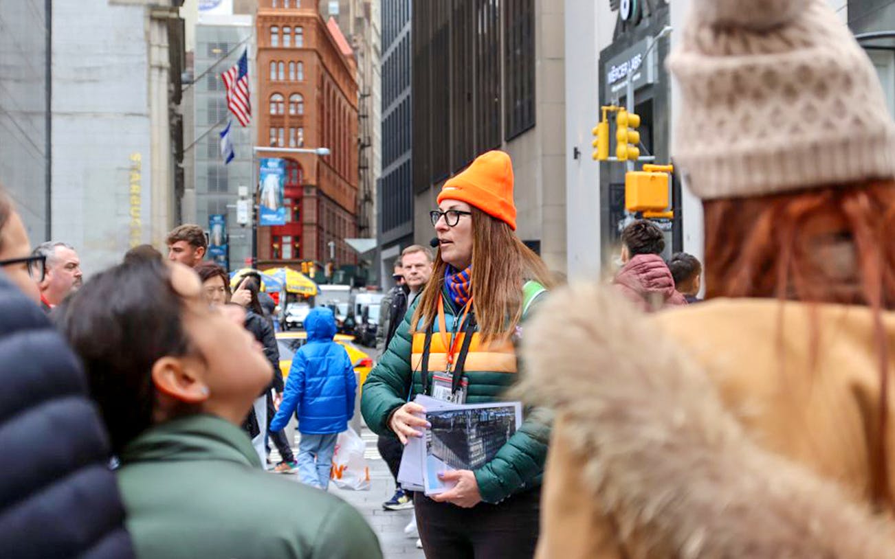 Tour guide leading a group near Ground Zero, New York City.
