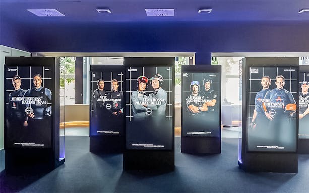 Sailing team displays at Barcelona America's Cup experience.