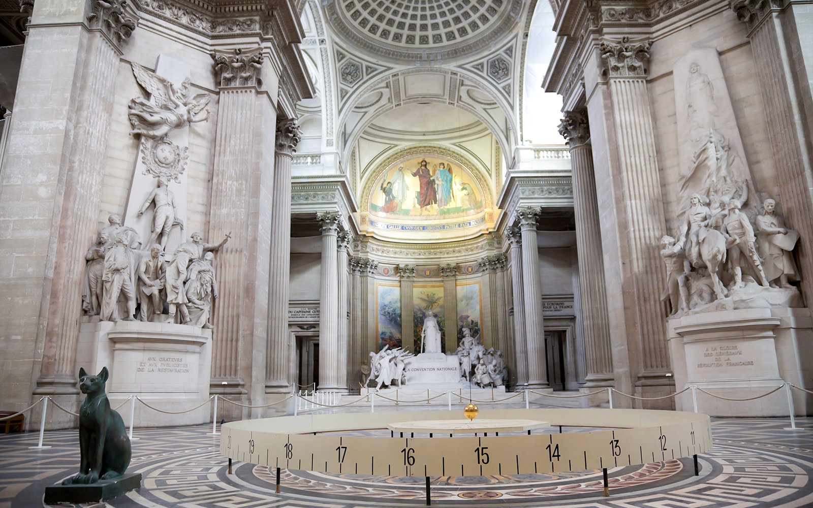 Foucault’s Pendulum inside the Pantheon, Paris, showcasing its historical significance.