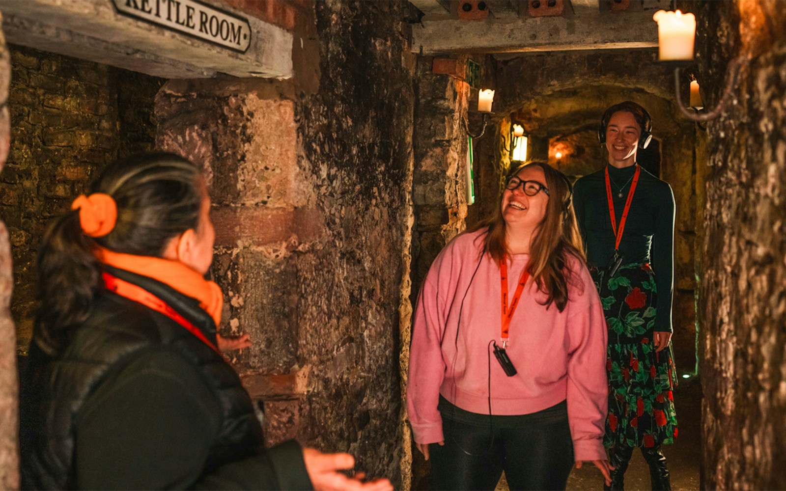 Guide leading guests through historic underground vaults.
