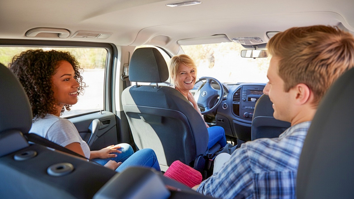Tourists enjoying transfer in car