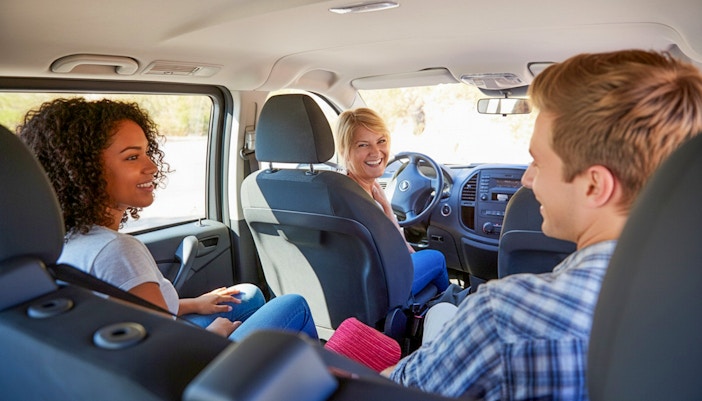 Tourists enjoying van transfer from Tirana to Bovilla Lake.