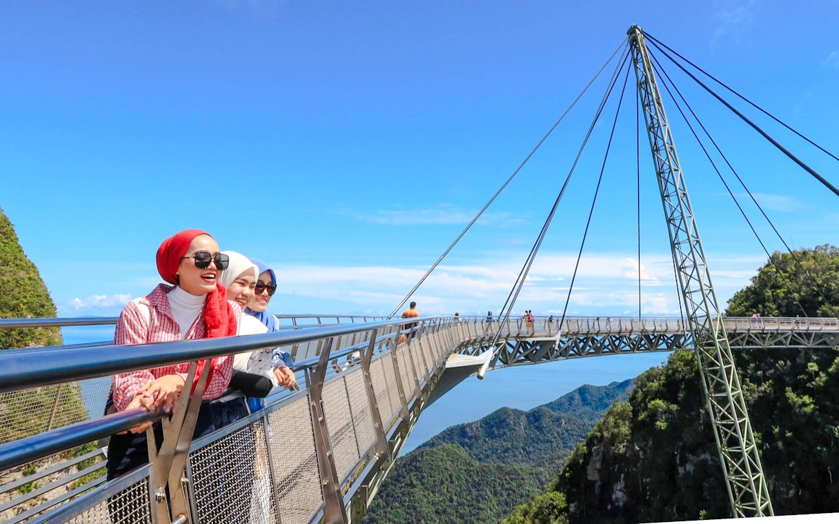 Women enjoying the view from Langkawi Skybridge, Malaysia.