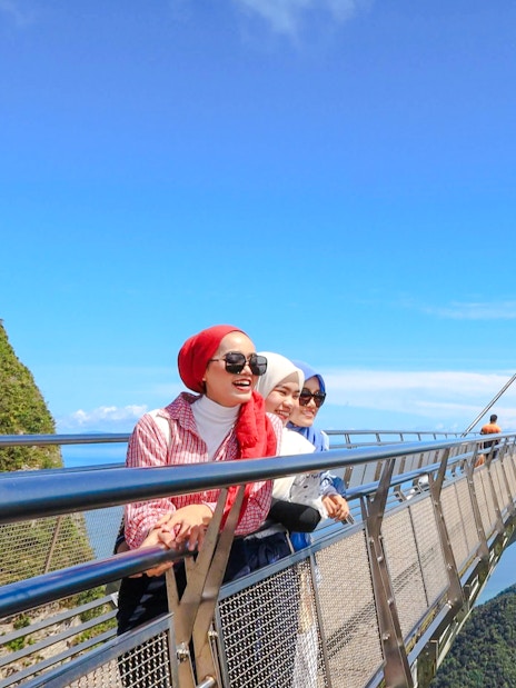 Women enjoying the view from Langkawi Skybridge, Malaysia.