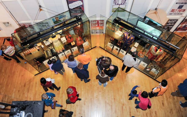 Visitors viewing exhibits on the second floor of the Country Music Hall of Fame in Nashville, Tennessee.
