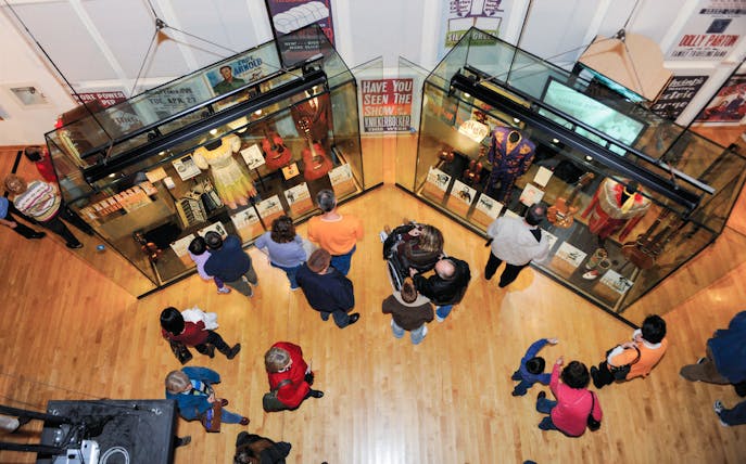 Visitors viewing exhibits on the second floor of the Country Music Hall of Fame in Nashville, Tennessee.