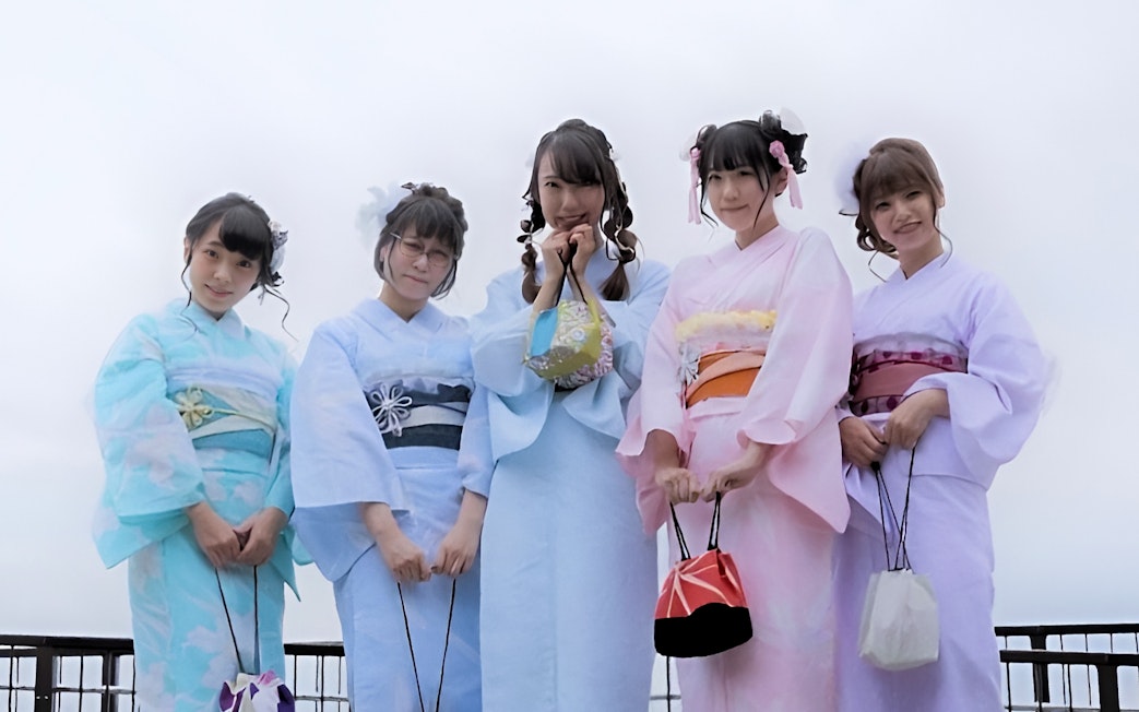 Group wearing kimonos in Asakusa, Tokyo, during a full-day rental experience.