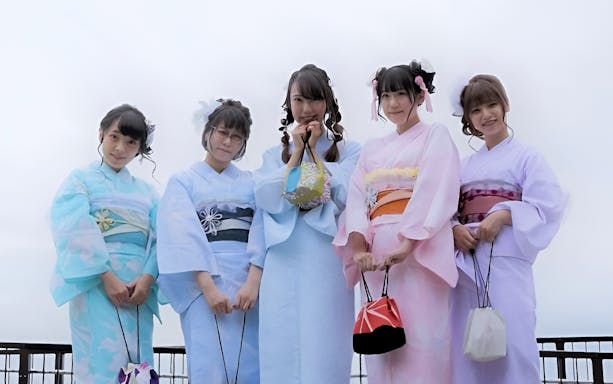 Group wearing kimonos in Asakusa, Tokyo, during a full-day rental experience.