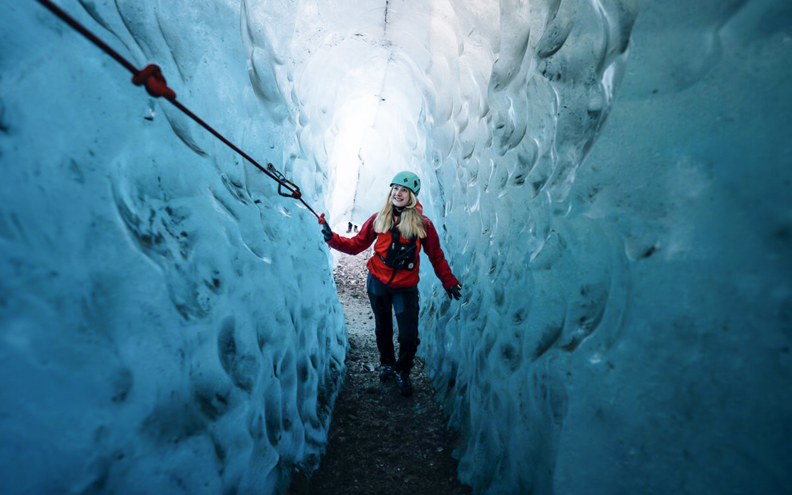 Guest exploring Blue Ice Cave in Vatnajökull, Iceland.