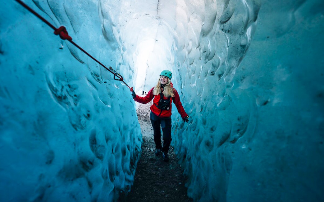 Guest exploring Blue Ice Cave in Vatnajökull, Iceland.