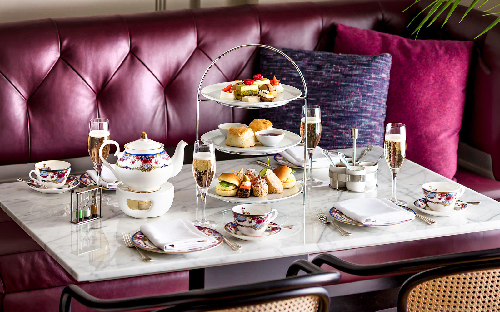 Afternoon tea set with pastries and sandwiches on a Seattle to Victoria ferry.
