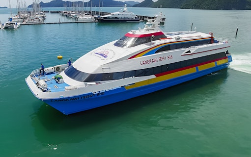 Langkawi Ferry 888 docked at marina with scenic island backdrop.